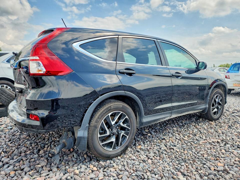 Photo 3 from auction – 2016 HONDA CR-V with VIN 5J6RM4H44GL075605