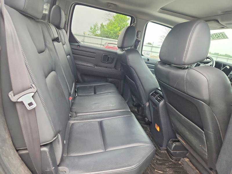 Photo 10 from auction – 2014 HONDA RIDGELINE with VIN 5FPYK1F60EB011367