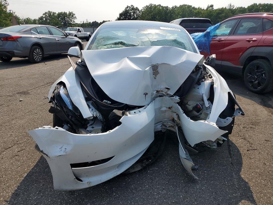 Photo 5 from auction – 2023 TESLA MODEL 3 with VIN 5YJ3E1EA4PF553977