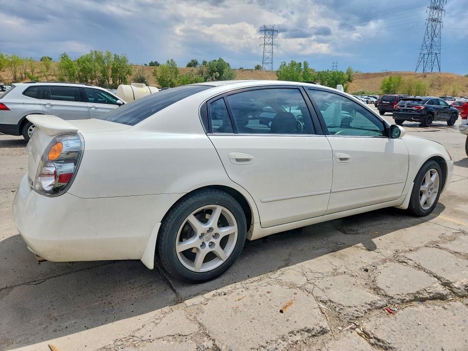 Photo 3 from auction – 2002 NISSAN ALTIMA with VIN 1N4BL11D02C161088