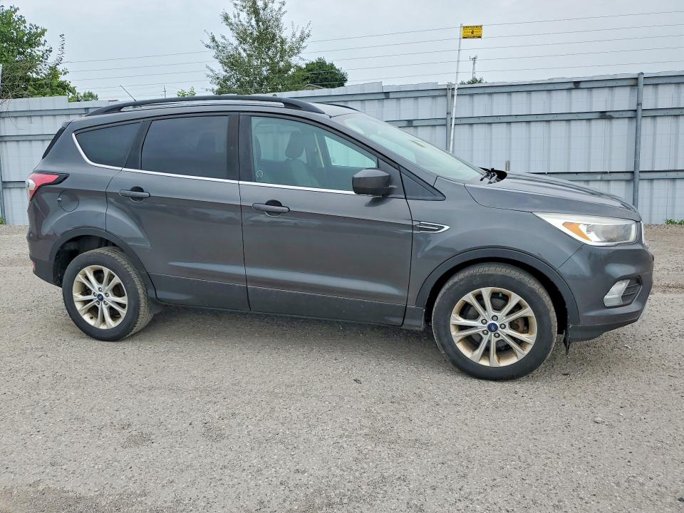 Photo 4 from auction – 2018 FORD ESCAPE with VIN 1FMCU0GD7JUB57802