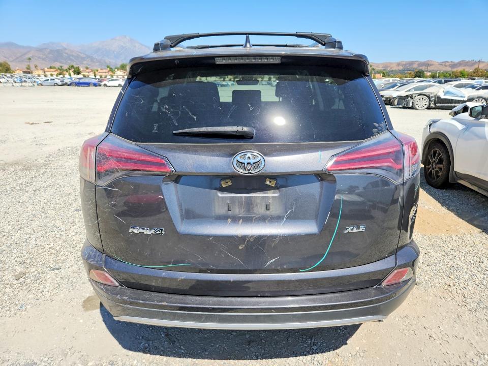 Photo 6 from auction – 2018 TOYOTA RAV4 with VIN JTMWFREV0JJ173899