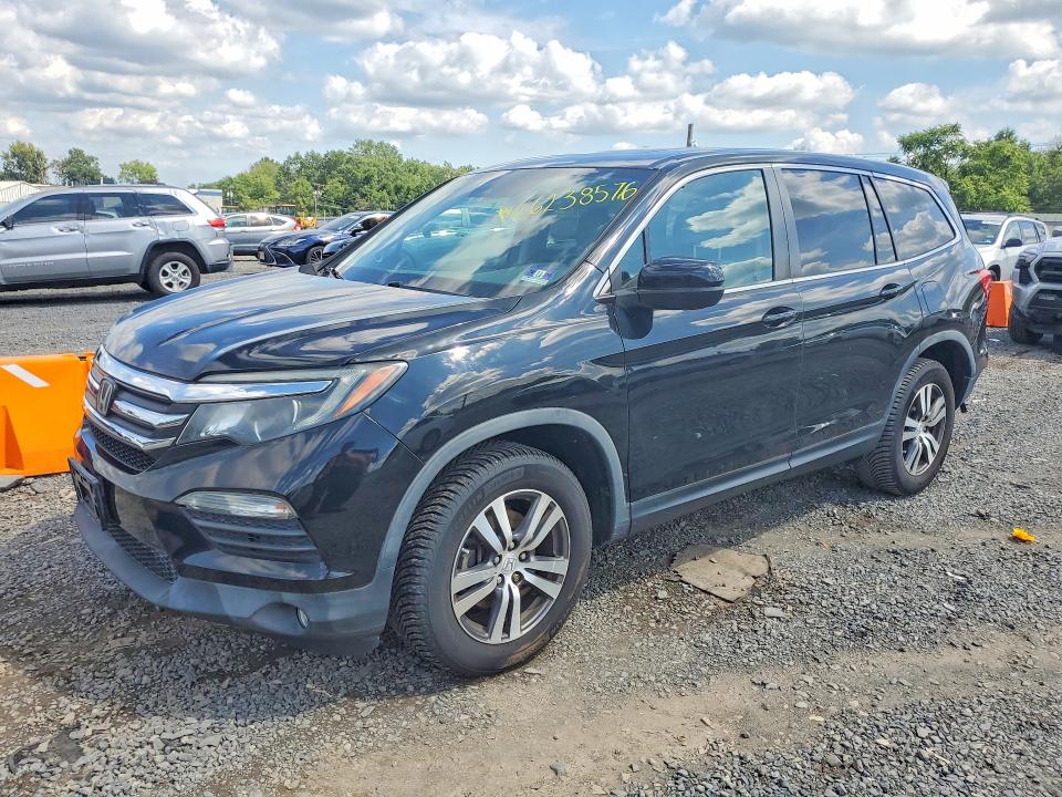 HONDA PILOT 2017 with VIN 5FNYF6H61HB070083 - Photo from auction