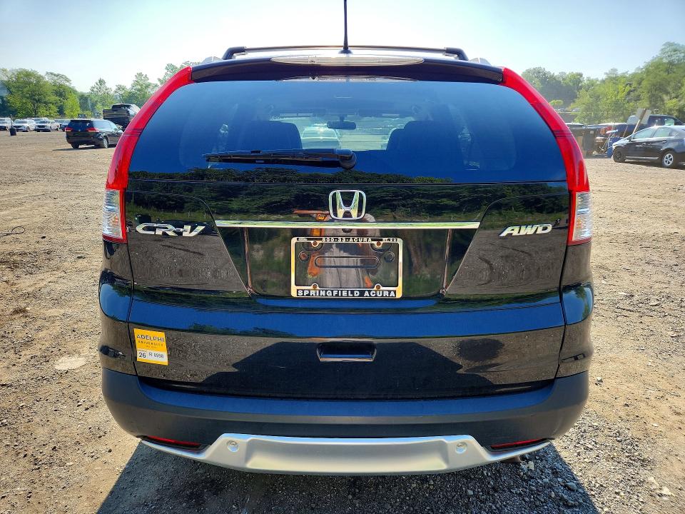 Photo 6 from auction – 2012 HONDA CR-V with VIN 2HKRM4H78CH615942