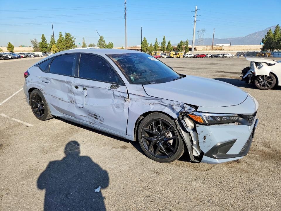 Photo 4 from auction – 2023 HONDA CIVIC with VIN 19XFL2H84PE004464