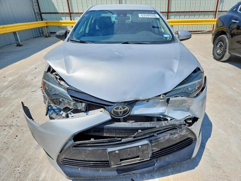 Photo 11 from auction – 2018 TOYOTA COROLLA with VIN 2T1BURHE4JC969647