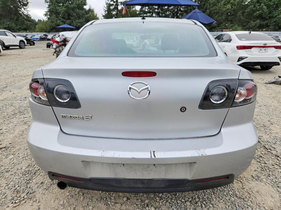 Photo 6 from auction – 2004 MAZDA 3 with VIN JM1BK12F941175132