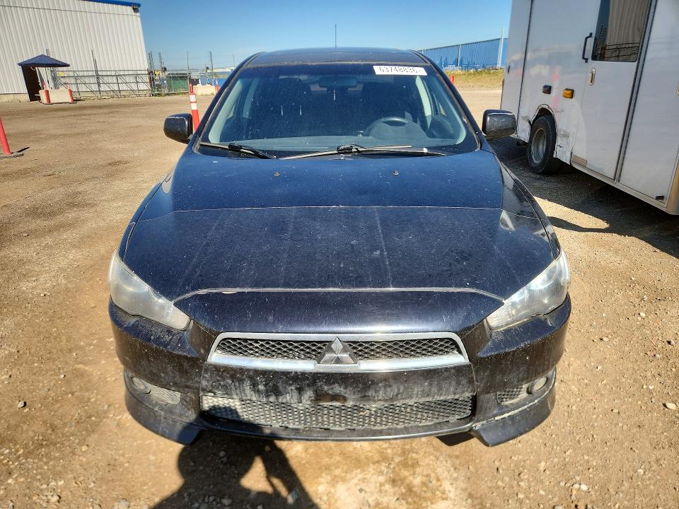 Photo 5 from auction – 2009 MITSUBISHI LANCER with VIN JA3AU26U79U602056