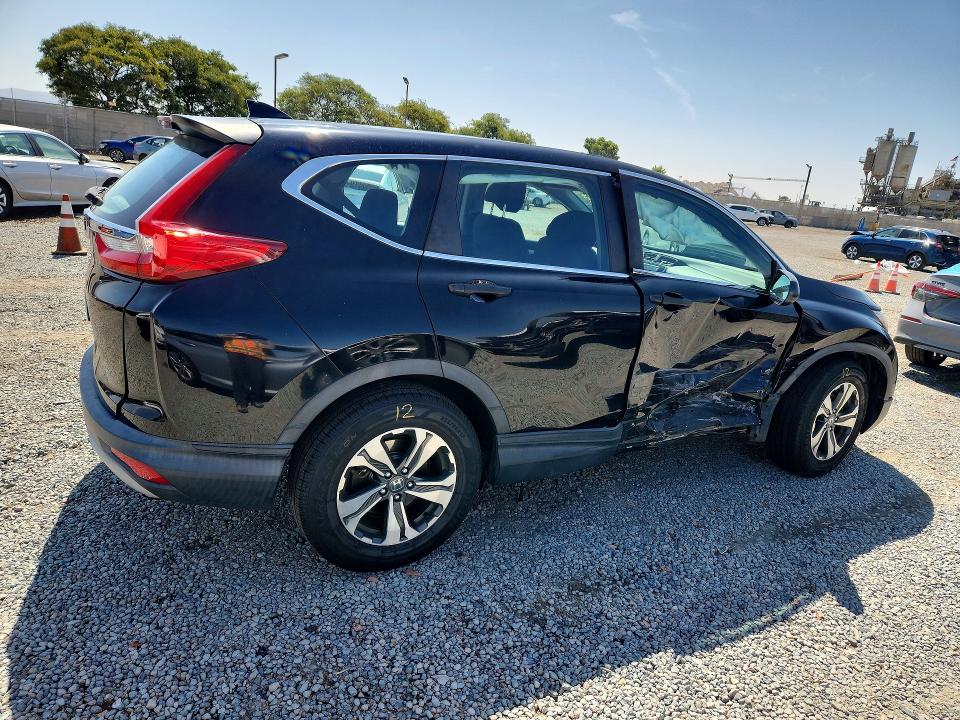 Photo 3 from auction – 2019 HONDA CR-V with VIN 2HKRW5H39KH416152