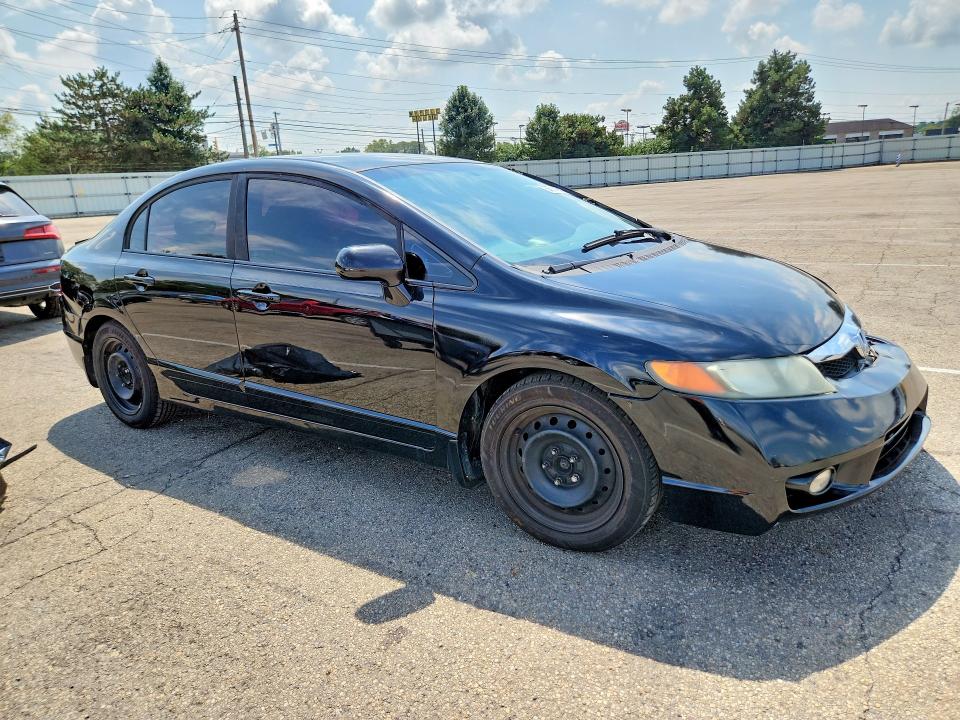 Photo 4 from auction – 2010 HONDA CIVIC with VIN 19XFA1F5XAE031782