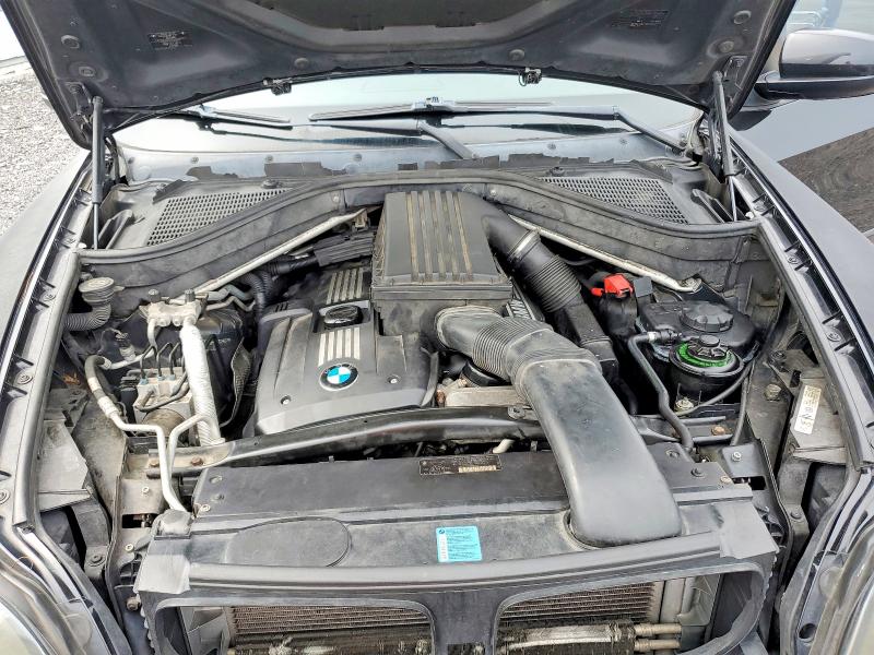 Photo 11 from auction – 2009 BMW X5 with VIN 5UXFE43599L262667