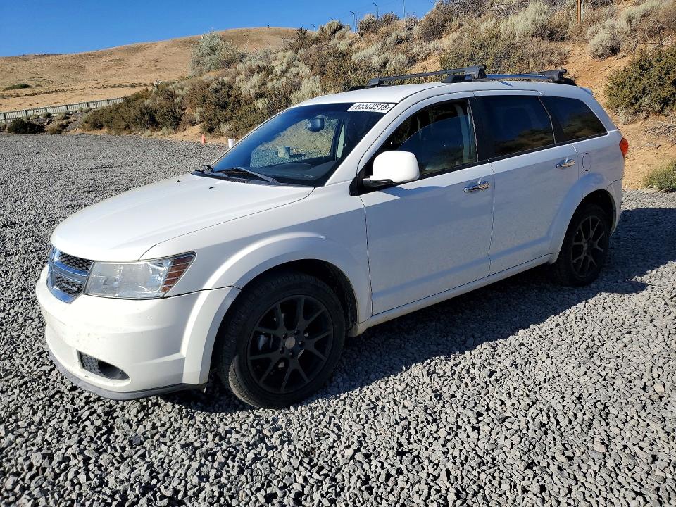 DODGE JOURNEY 2011 with VIN 3D4PH3FG2BT506113 - Photo from auction