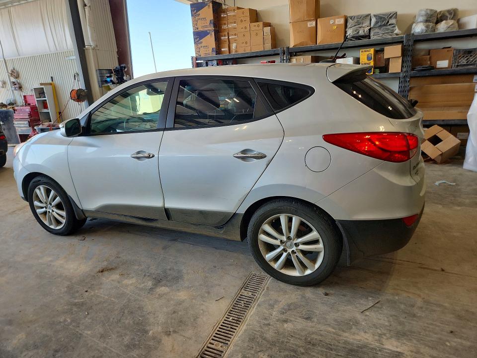 Photo 2 from auction – 2011 HYUNDAI TUCSON with VIN KM8JUCAC3BU226172