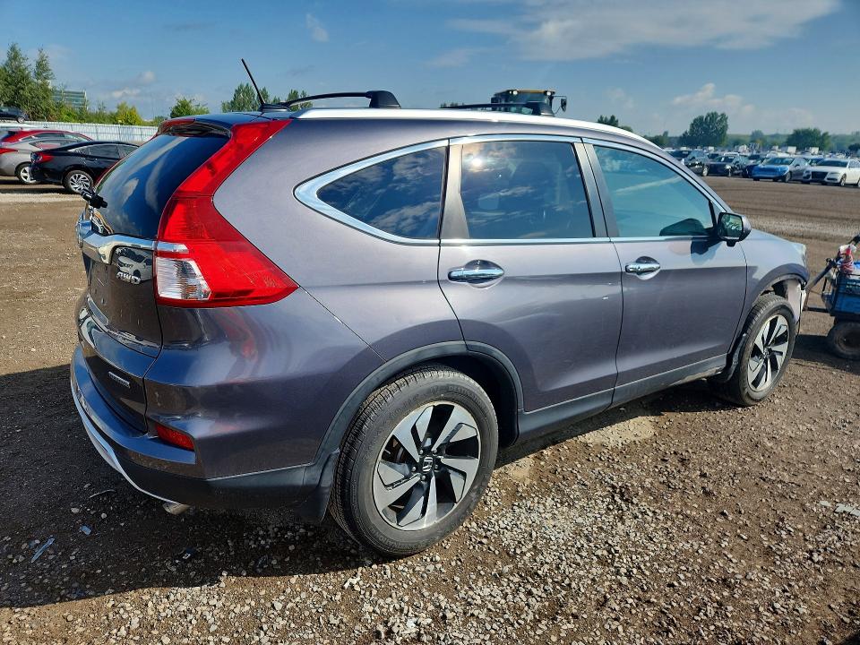 Photo 3 from auction – 2016 HONDA CR-V with VIN 5J6RM4H98GL800697