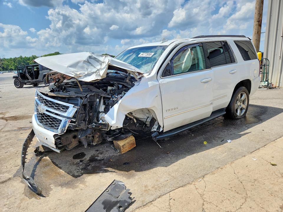 CHEVROLET TAHOE 2019 with VIN 1GNSKAKC7KR299086 - Photo from auction