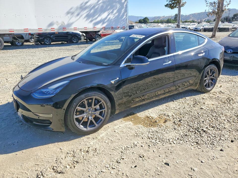 TESLA MODEL 3 2018 with VIN 5YJ3E1EB6JF144184 - Photo from auction