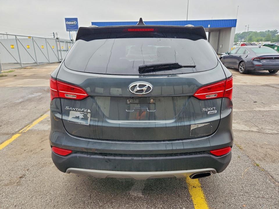 Photo 6 from auction – 2014 HYUNDAI SANTA FE SPORT with VIN 5XYZUDLB7EG174150