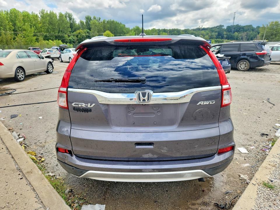 Photo 6 from auction – 2015 HONDA CR-V with VIN 5J6RM4H75FL055940