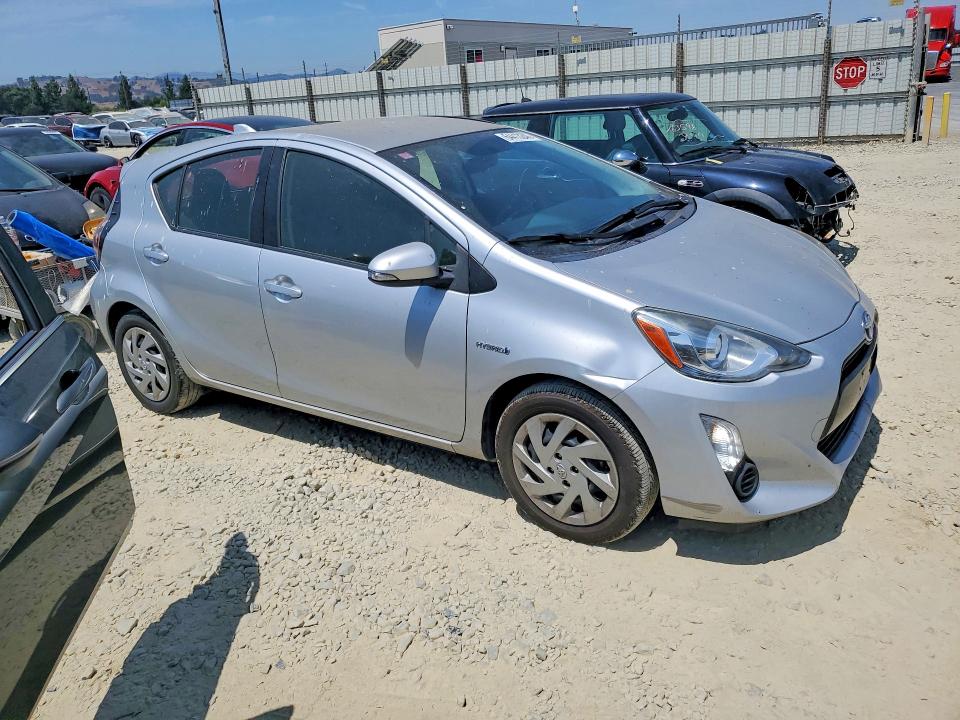 Photo 4 from auction – 2015 TOYOTA PRIUS C with VIN JTDKDTB31F1095032