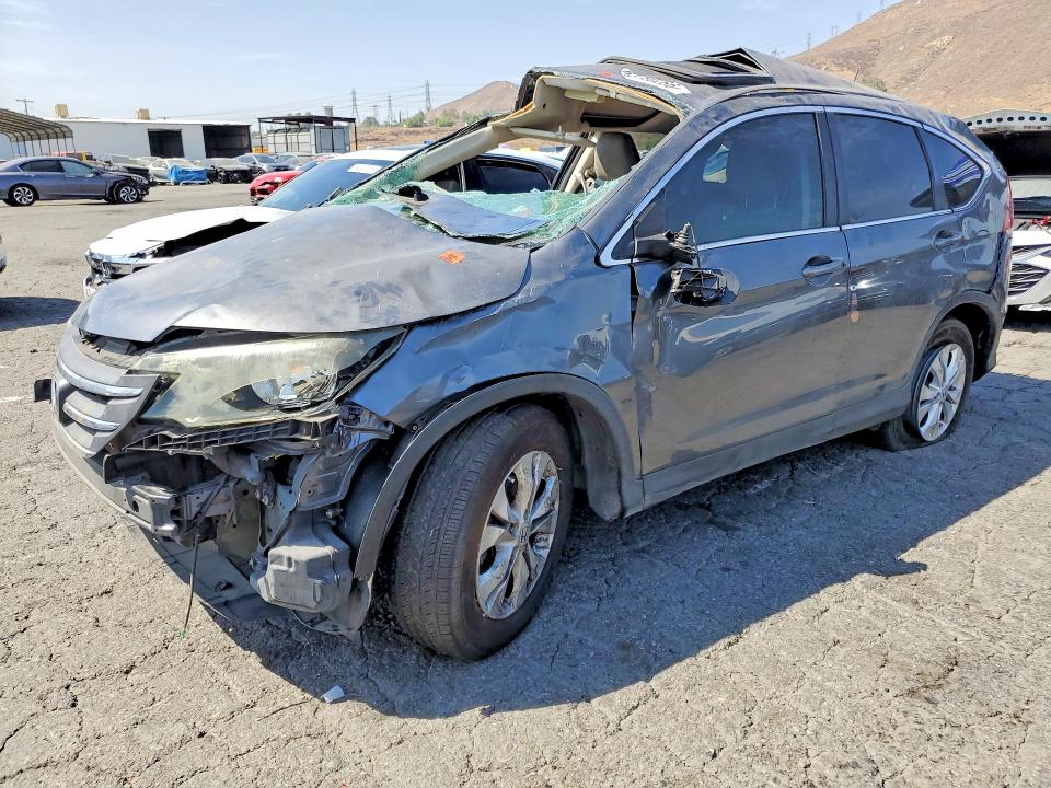 HONDA CR-V 2013 with VIN 3CZRM3H54DG702914 - Photo from auction