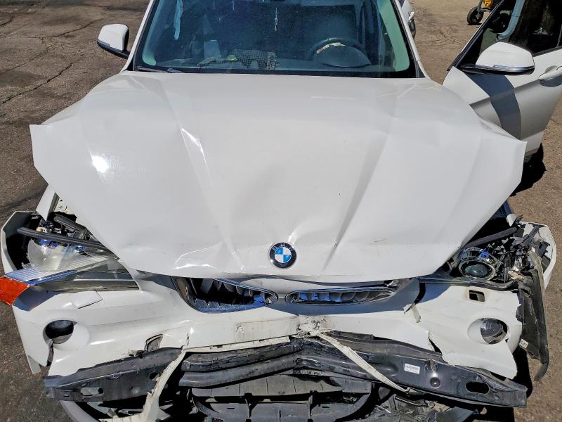 Photo 11 from auction – 2013 BMW X1 with VIN WBAVM5C55DVV89051