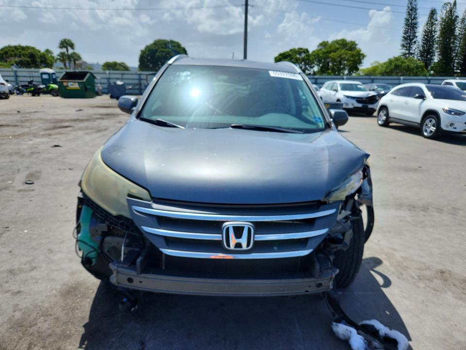 Photo 5 from auction – 2014 HONDA CR-V with VIN 5J6RM3H7XEL015572