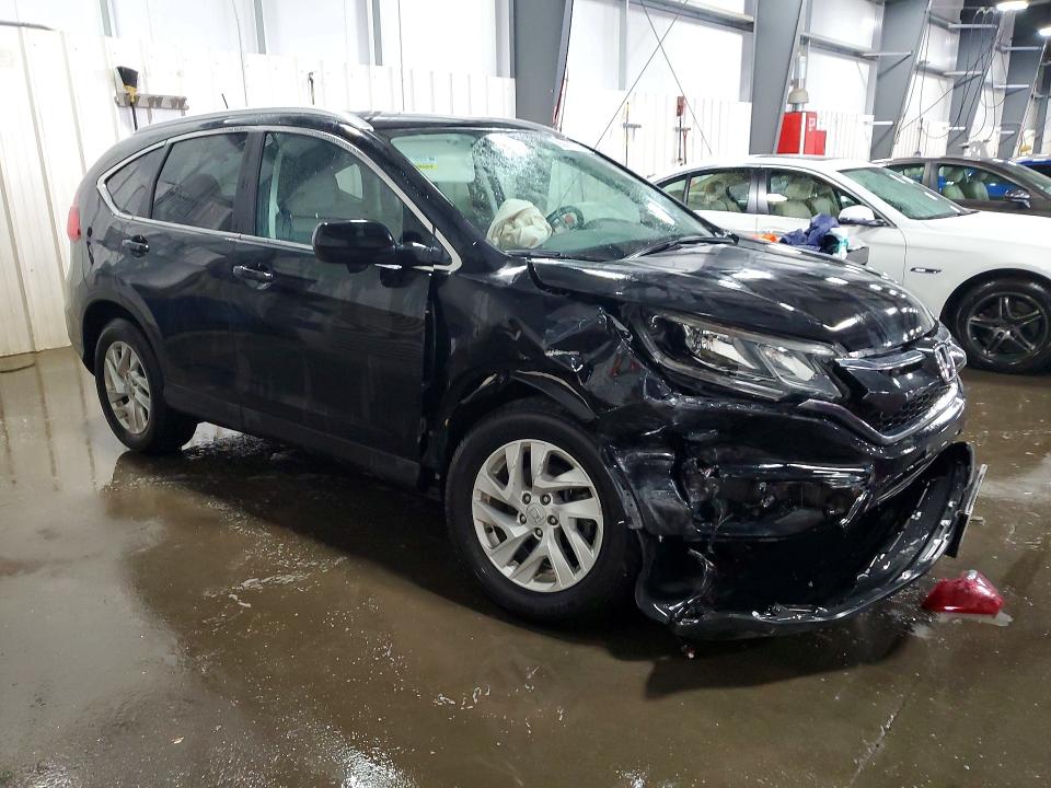 Photo 4 from auction – 2016 HONDA CR-V with VIN 2HKRM4H76GH679581