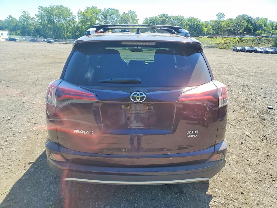 Photo 6 from auction – 2016 TOYOTA RAV4 with VIN 2T3RFREV8GW450113