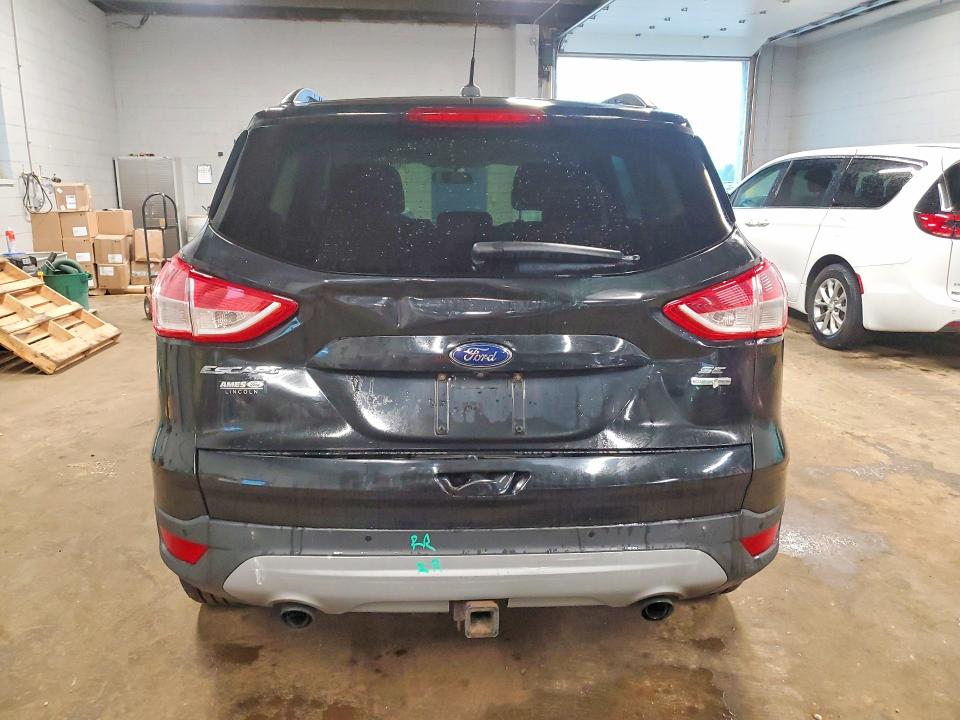 Photo 6 from auction – 2014 FORD ESCAPE with VIN 1FMCU9G91EUA77434