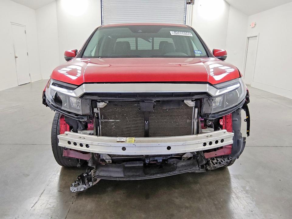 Photo 5 from auction – 2023 HONDA RIDGELINE with VIN 5FPYK3F79PB007597