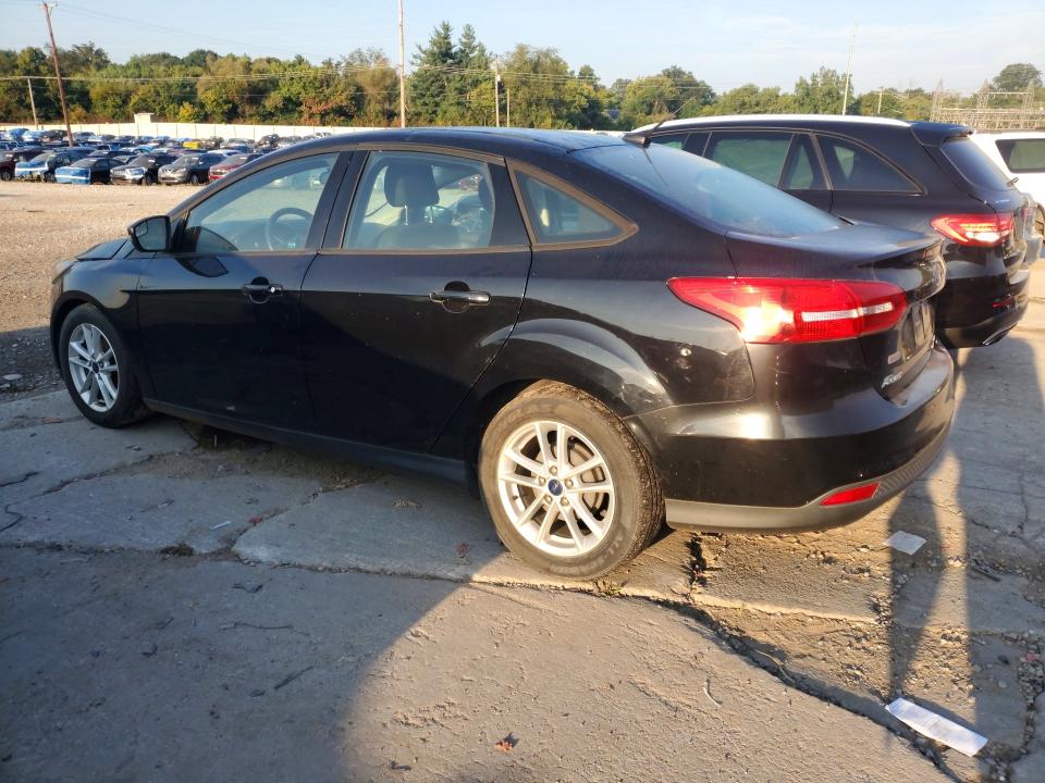 Photo 2 from auction – 2016 FORD FOCUS with VIN 1FADP3F24GL335882