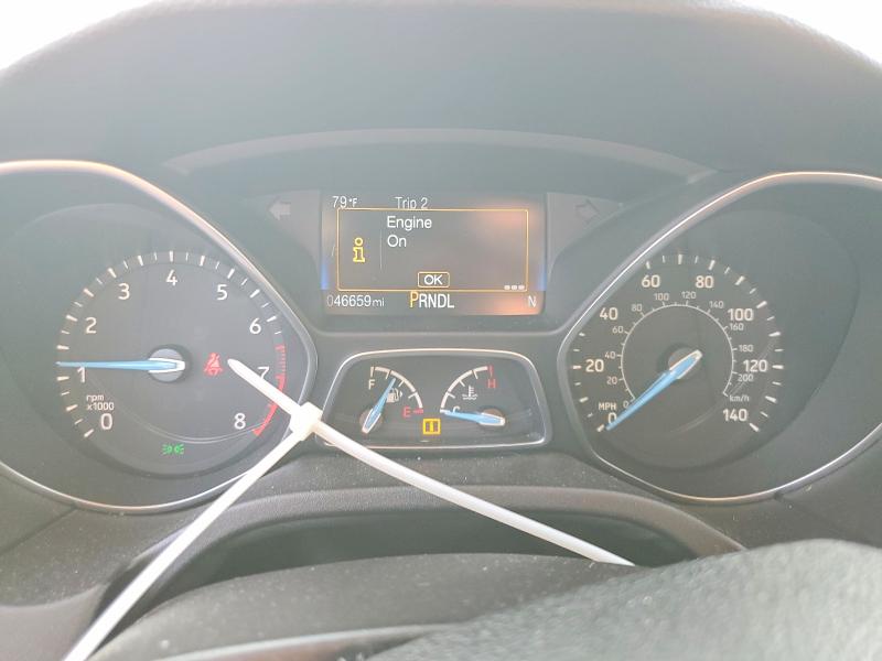 Photo 9 from auction – 2016 FORD FOCUS with VIN 1FADP3F2XGL390708
