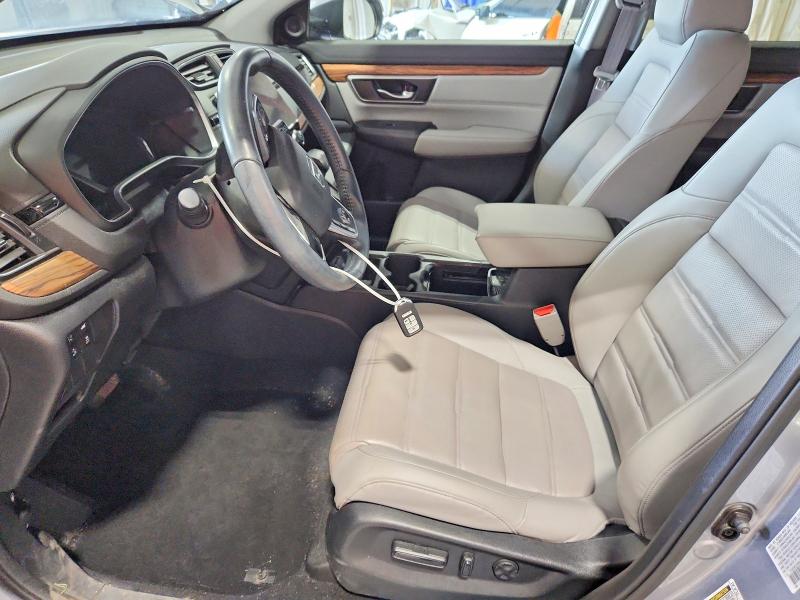 Photo 7 from auction – 2018 HONDA CR-V with VIN 7FARW2H86JE067544