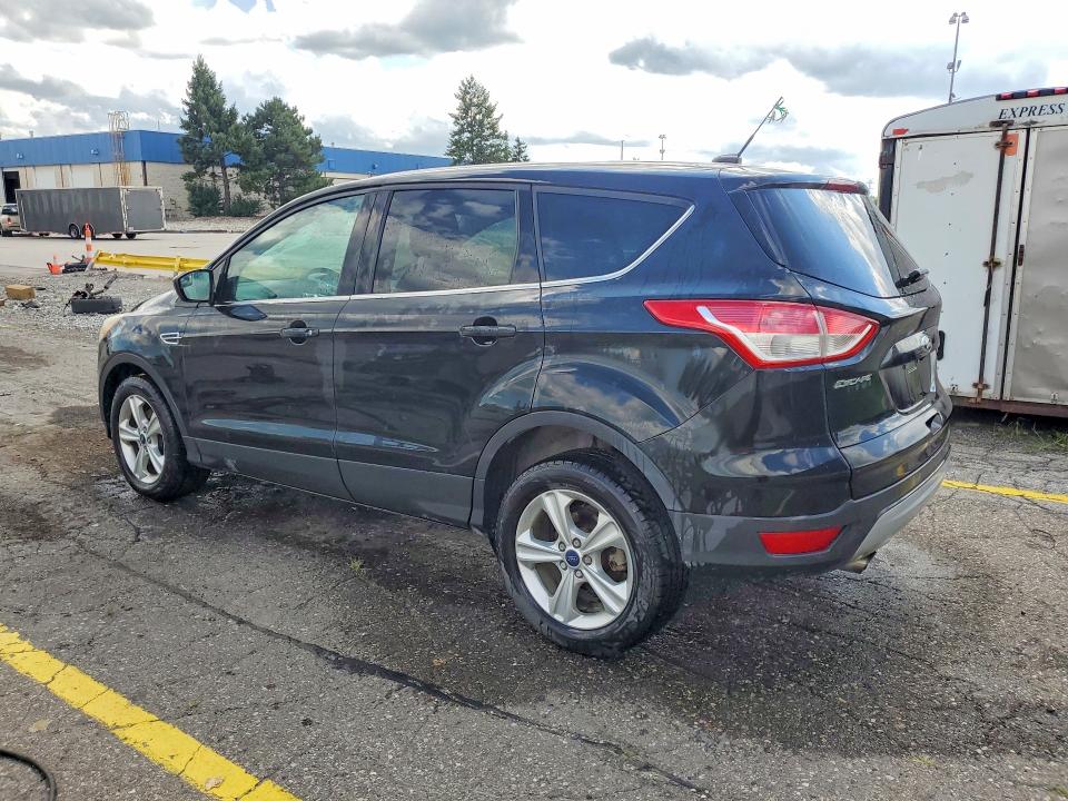 Photo 2 from auction – 2014 FORD ESCAPE with VIN 1FMCU0GX1EUA69439