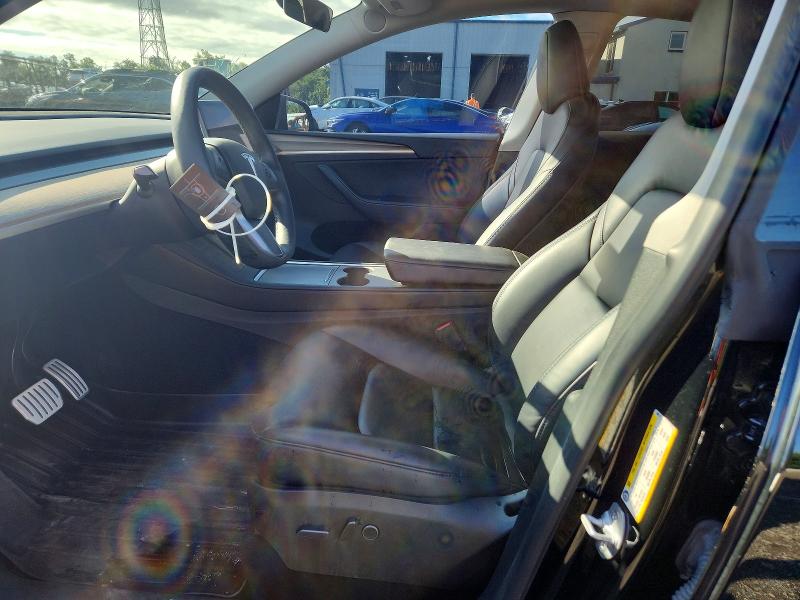 Photo 7 from auction – 2023 TESLA MODEL Y with VIN 7SAYGDEF4PF980110