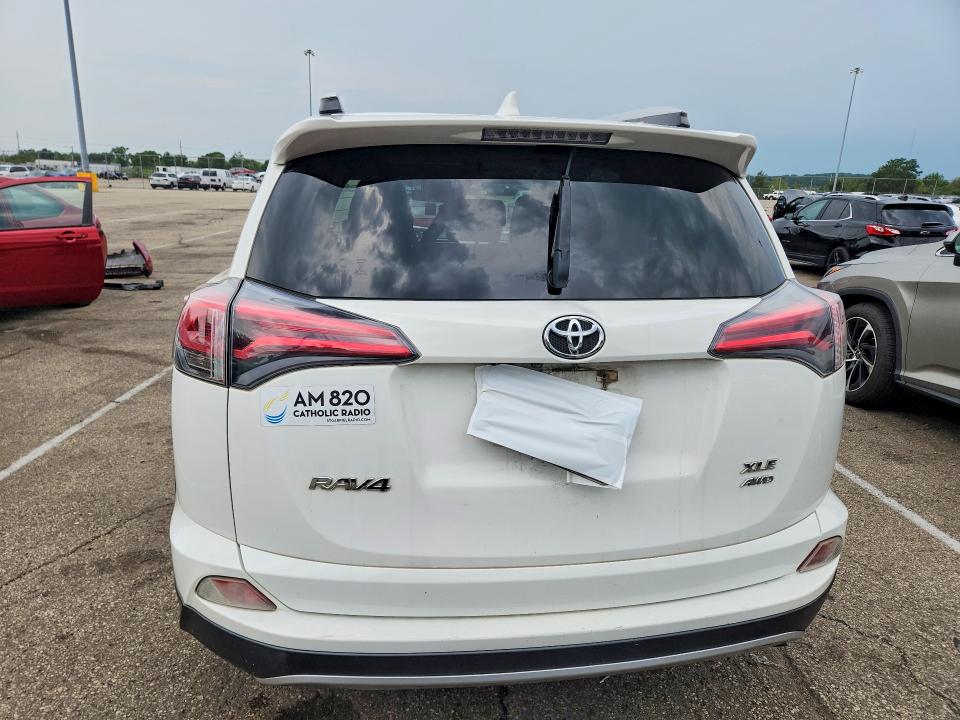Photo 6 from auction – 2016 TOYOTA RAV4 with VIN JTMRFREVXGJ093418