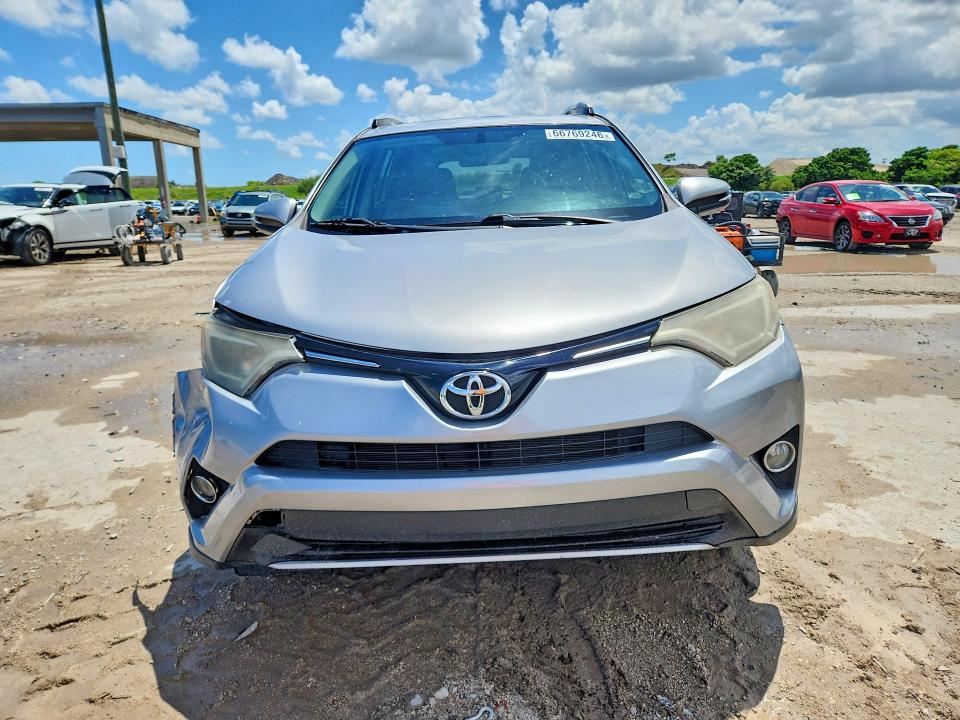 Photo 5 from auction – 2016 TOYOTA RAV4 with VIN 2T3WFREV0GW308101