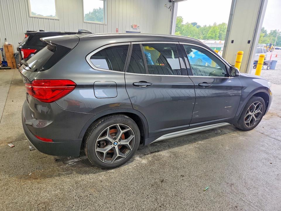 Photo 3 from auction – 2016 BMW X1 with VIN WBXHT3C31G5E47182