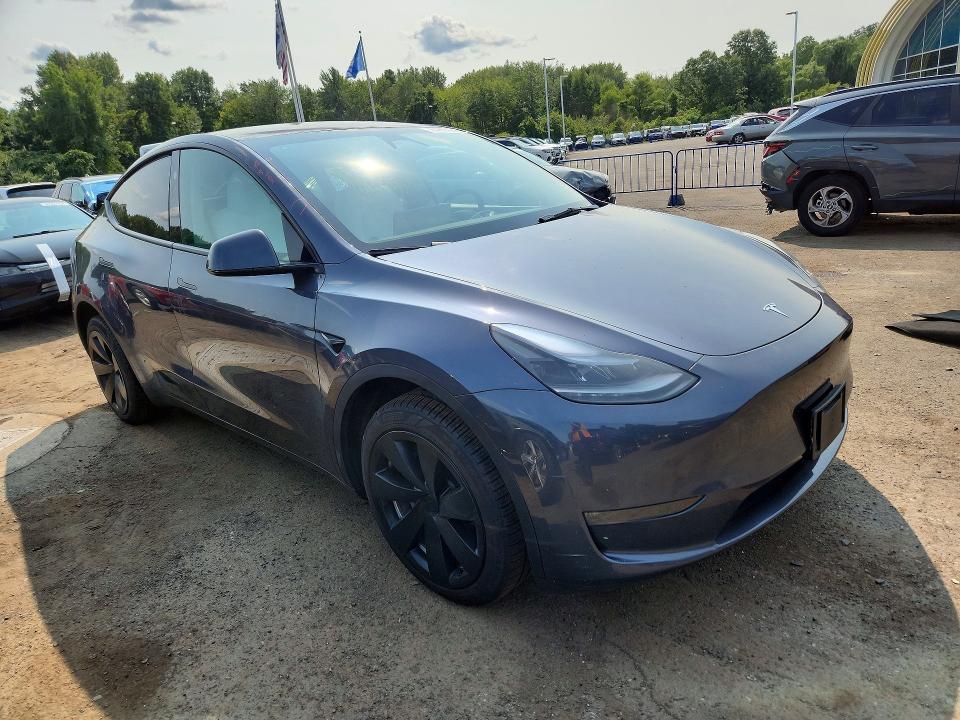Photo 4 from auction – 2023 TESLA MODEL Y with VIN 7SAYGDEE2PA173721