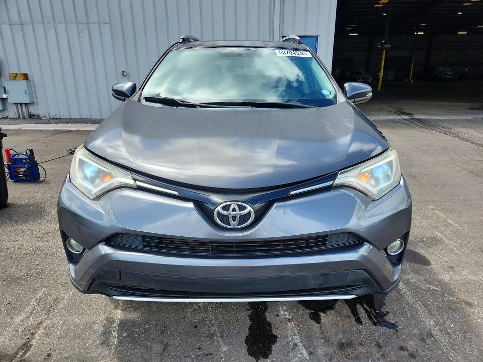 Photo 5 from auction – 2016 TOYOTA RAV4 with VIN 2T3WFREV4GW266872