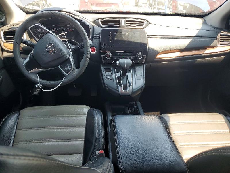 Photo 8 from auction – 2018 HONDA CR-V with VIN 7FARW2H51JE069269
