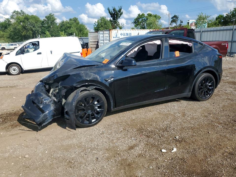 TESLA MODEL Y 2024 with VIN 7SAYGDEE8RA276239 - Photo from auction