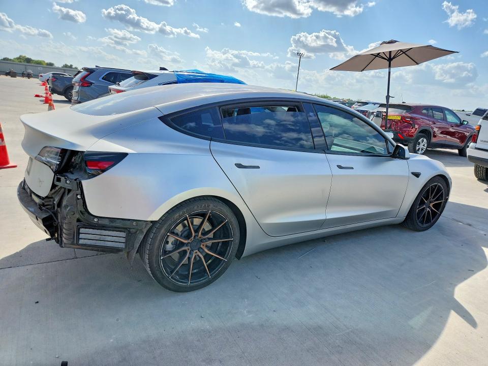 Photo 3 from auction – 2018 TESLA MODEL 3 with VIN 5YJ3E1EB1JF084735