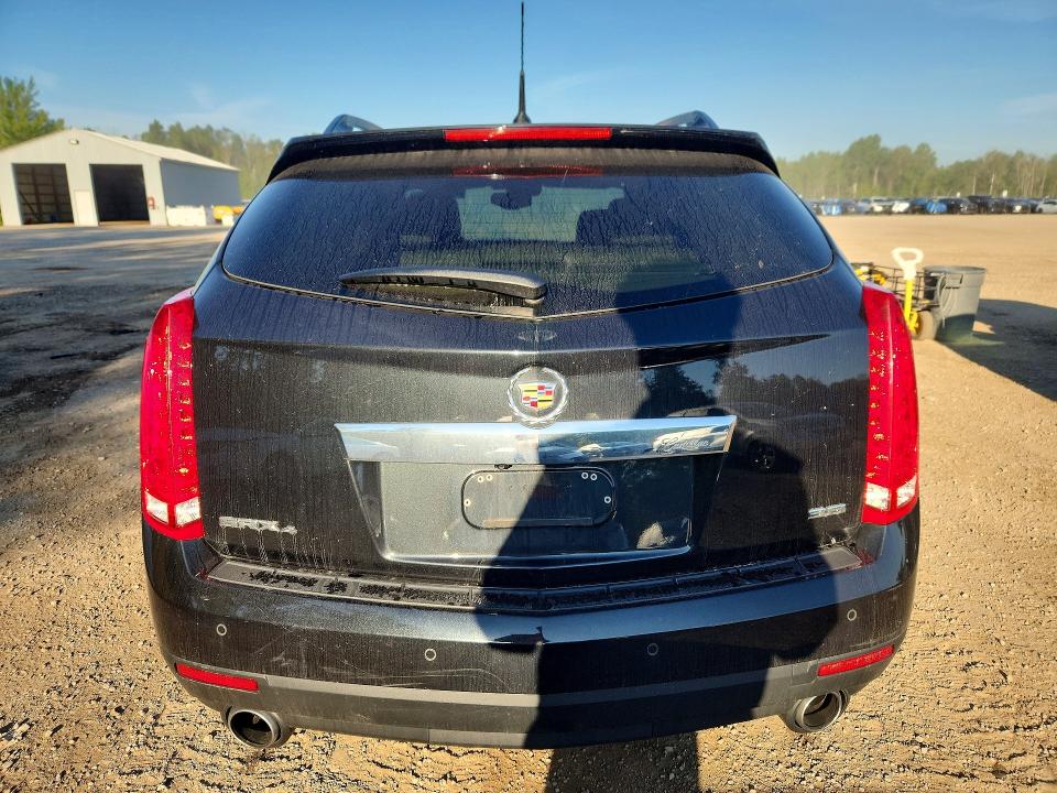 Фото 6 с аукциона – 2014 CADILLAC SRX с VIN 3GYFNEE34ES634269