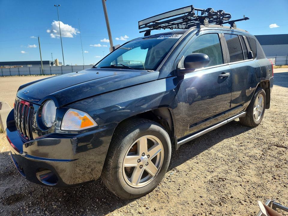 JEEP COMPASS 2007 with VIN 1J8FF47W57D417460 - Photo from auction