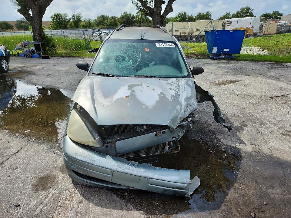 Photo 5 from auction – 2003 FORD FOCUS with VIN 1FAFP36383W213942