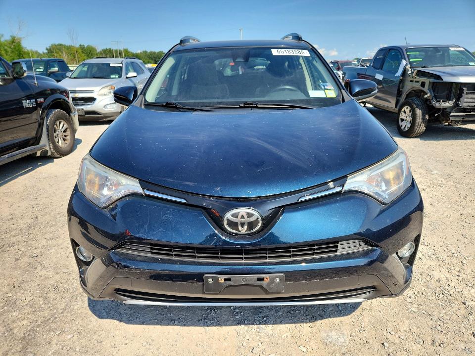 Photo 5 from auction – 2017 TOYOTA RAV4 with VIN JTMRFREV0HJ171111