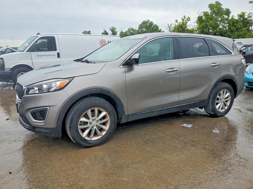 KIA SORENTO 2018 with VIN 5XYPG4A33JG379436 - Photo from auction