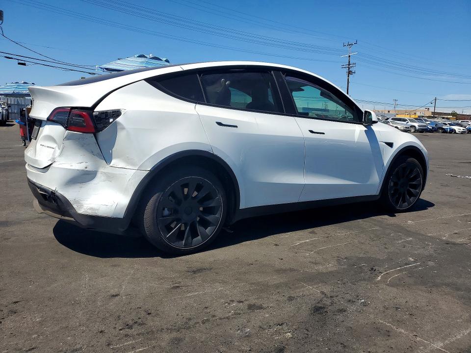 Photo 3 from auction – 2023 TESLA MODEL Y with VIN 7SAYGDEE9PF621925