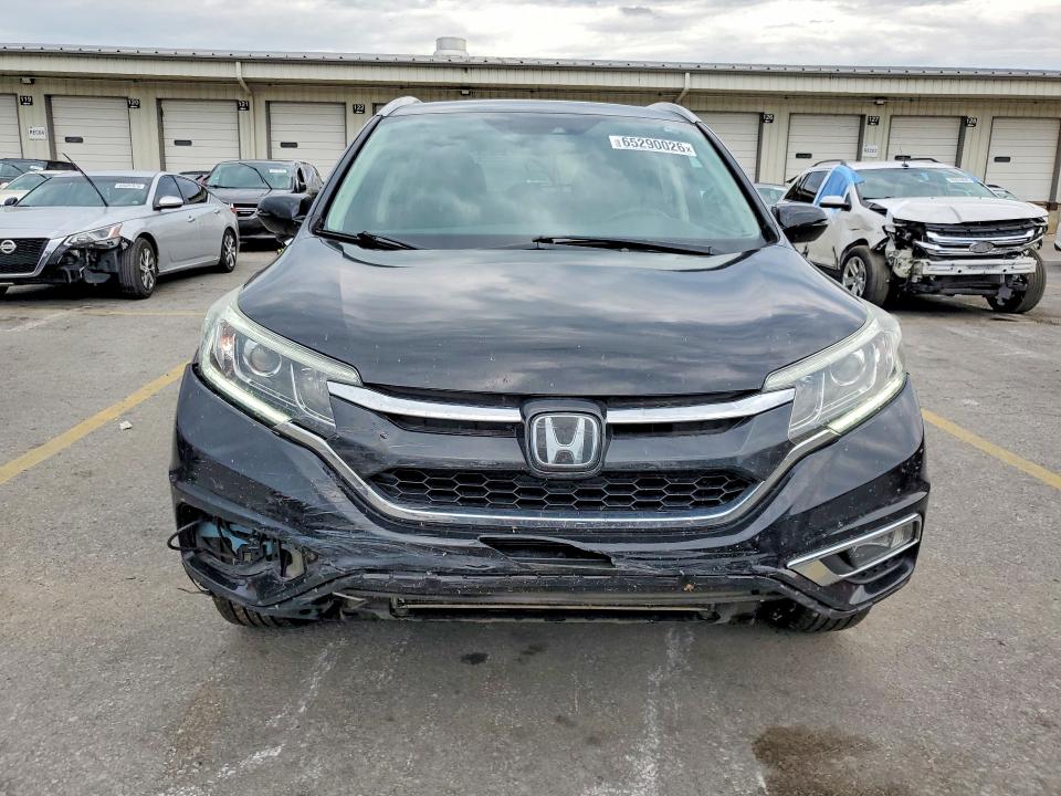 Photo 5 from auction – 2016 HONDA CR-V with VIN 5J6RM4H98GL130973